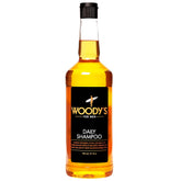 Woody's Daily Shampoo bottle pour shows a rich lather for daily scalp care.