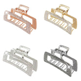 WORTL gold rhinestone claw clip securely grips thick hair for a stylish look.