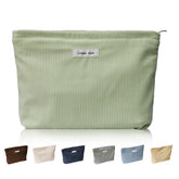Wudygirl travel makeup bag with corduroy outer for durable luxury on the go