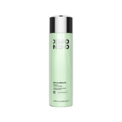 XMONDO Hair Recalibrate bottle closeup—bond repair conditioning for damaged hair