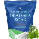 Yareli magnesium flakes dissolving in warm water for a relaxing Dead Sea bath.