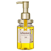 Yeeyzzhoney Deep Moist Oil bottle provides lightweight hydration and shine.
