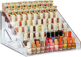 YIEZI nail polish organizer displays 84 bottles across seven clear acrylic shelves.