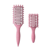 Yingbtr curl-defining brush with ergonomic handle for smooth detangling and defined curls.