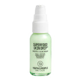 Youth To The People Skin Drip bottle closeup, barrier-friendly serum for dewy glow.
