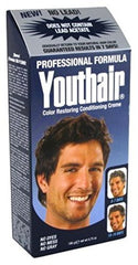 Youthair creme lead-free application closeup showing creamy texture for coverage.