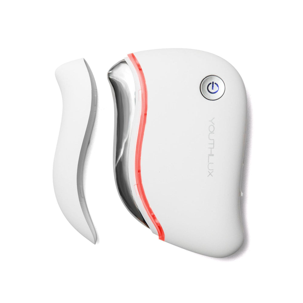 YOUTHLUX ProSculpt heated gua sha massager gliding on the jawline for a relaxing routine