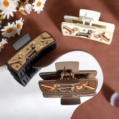 Yussti dachshund dog hair clip adds playful flair to outfits.