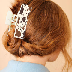 Yussti Western Leather Hair Claw Cowhide securely holds thick or thin hair throughout the day.