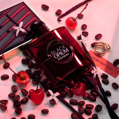 YSL Black Opium Over Red bottle side view highlights sleek evening-ready packaging.