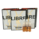 YSL Libre Le Parfum sample vial tilted for on-the-go touch-ups and scent preview.