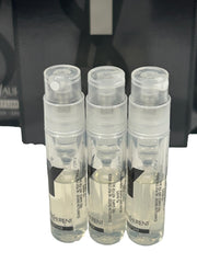 Close-up of Yves Saint Laurent Y Men 1-2ml vial highlighting compact portability.