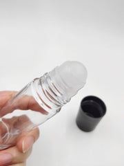 YYNGJCK clear roller bottle cap close-up highlighting leak-proof capability.