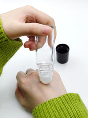 YYNGJCK clear roller bottle front view for travel-friendly essential oil application.