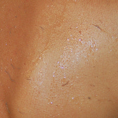 Zakia's Morocco Kessa glove hand exfoliation demonstrates firm back-and-forth motion for smoother skin