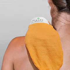 Zakia's Morocco Original Kessa exfoliating glove in use to remove dead skin