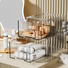 ZHIAI clear stackable cosmetic organizer 2-pack on a vanity keeps cosmetics visible.