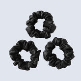 ZIMASILK silk scrunchies three-pack in black close-up showing soft texture and gentle grip
