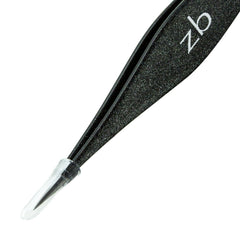 Zizzili Basics eyebrow shaping tweezers with precision-aligned tips for controlled grooming.