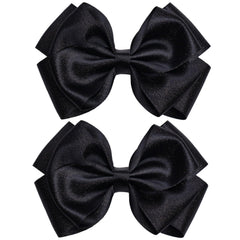 Zolyco 4.5-inch black satin bow clip close-up showing premium texture for girls.