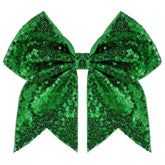 Zolyco large glitter cheer bow 7in green close-up adds standout sparkle to cheer outfits.