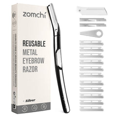 ZOMCHI polished silver razor in hand for precise brow shaping and facial grooming.