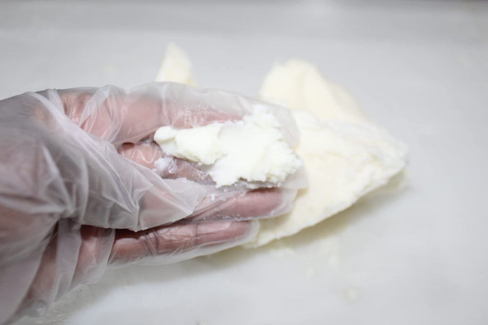 3CAYG whipped body butter preparation shows light, easy-to-spread formula.
