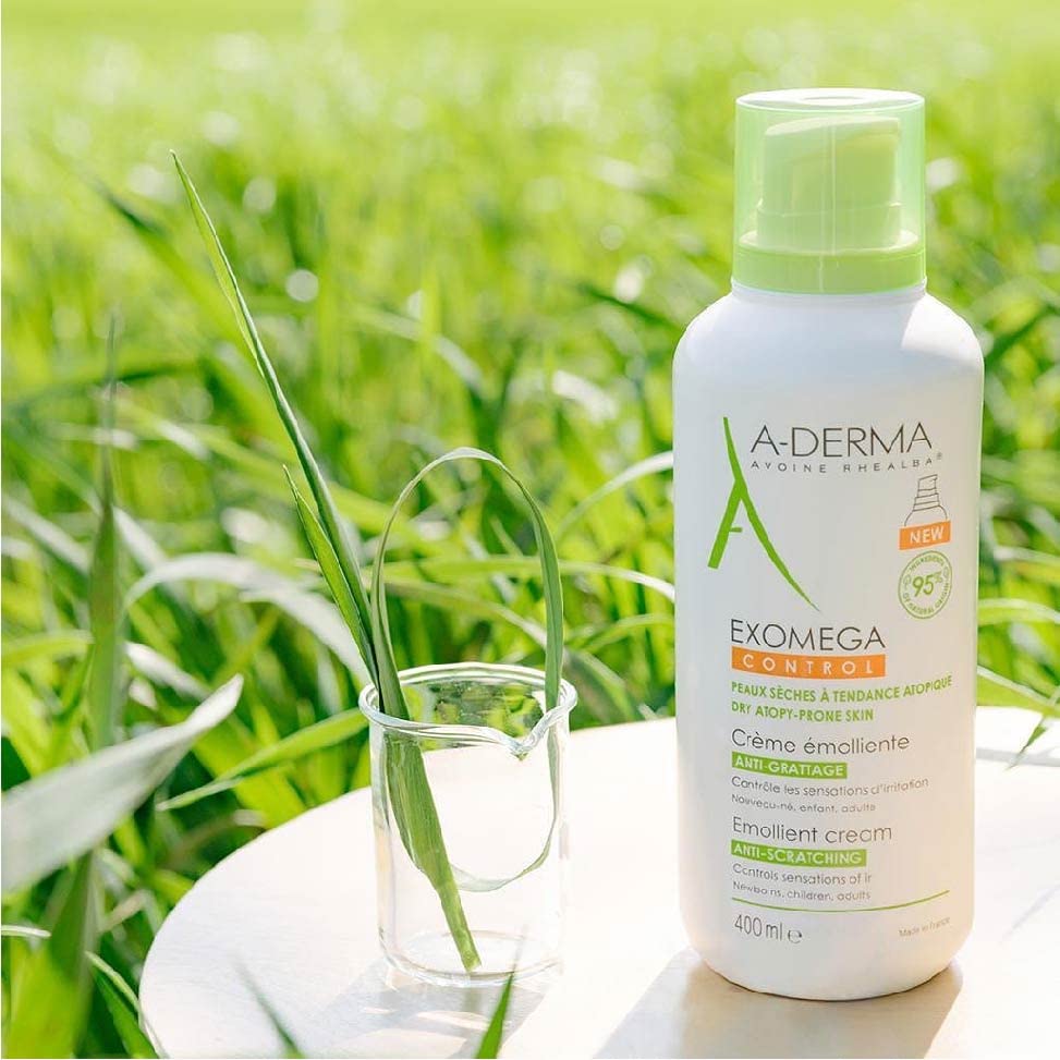 A-Derma Exomega Emollient Cream applied on arm for easy absorption.