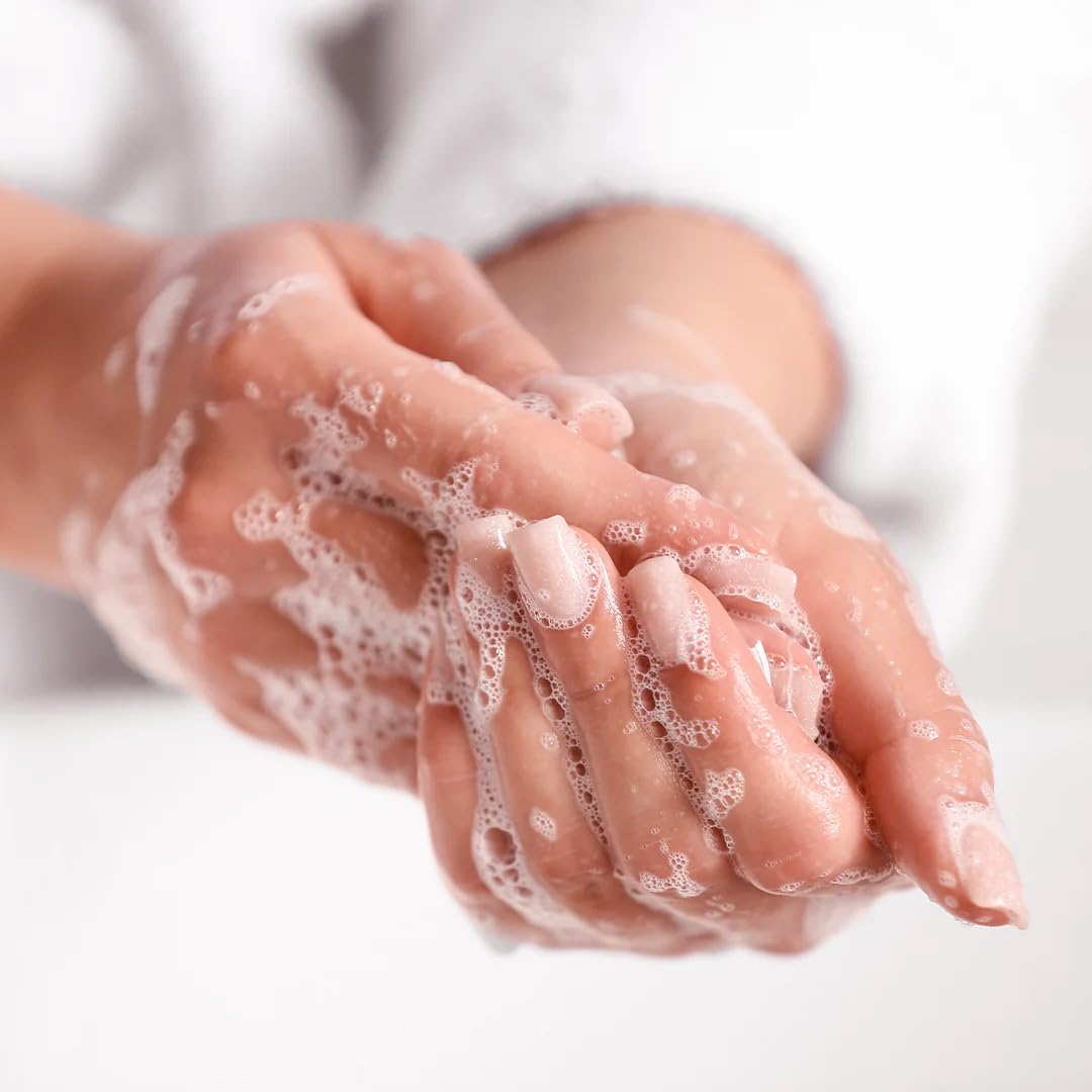 A LA MAISON soap liquid french sea salt lather closeup — rich glycerin for skin-softening foam.