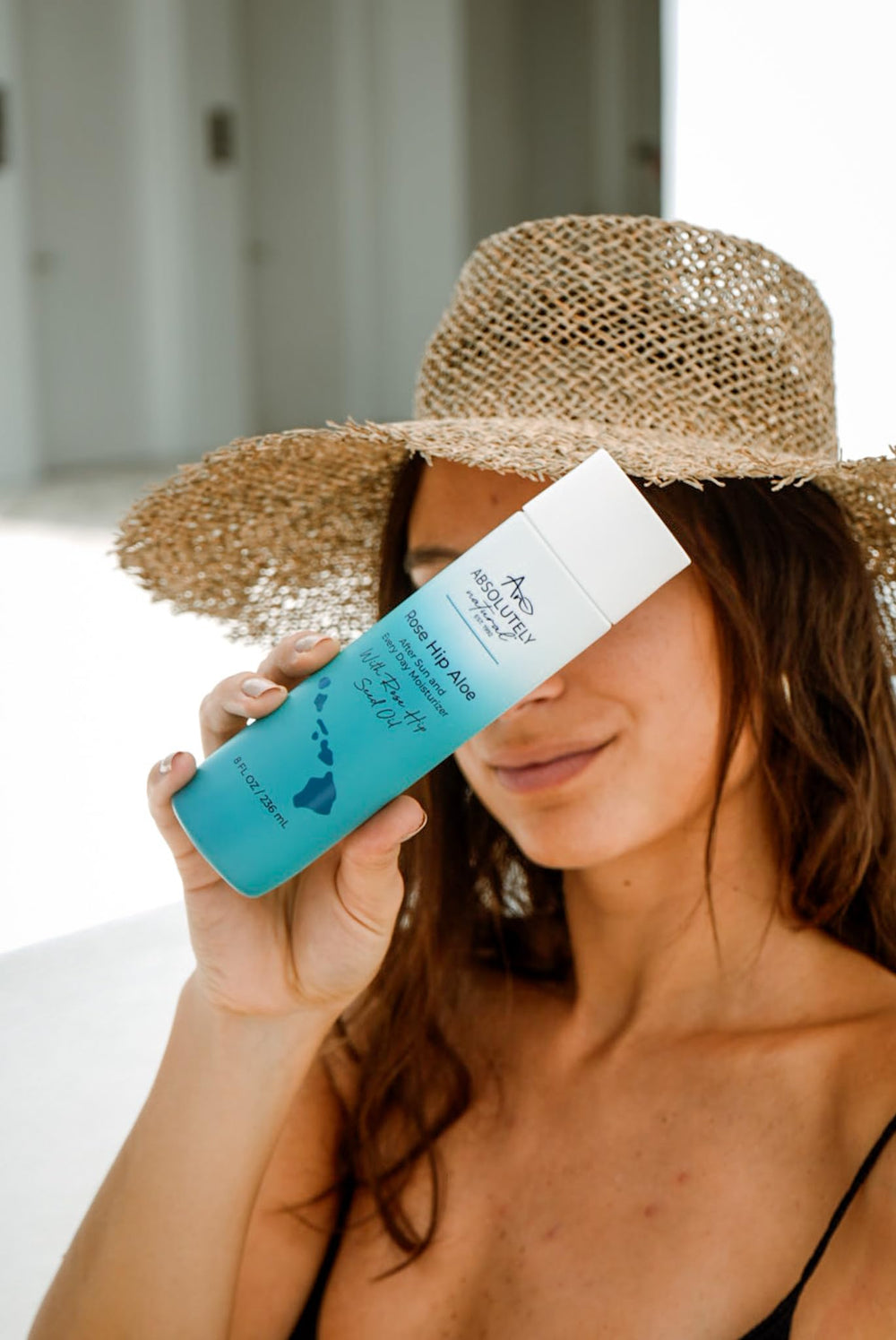 Absolutely Natural after-sun lotion texture close-up showing creamy, quick-absorbing hydration