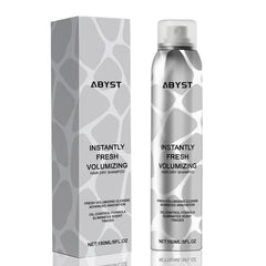 ABYST Dry Shampoo Spray bottle with spray nozzle, delivering instant freshness after workouts.