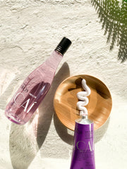 Acai oil ingredient bottle emphasizes nourishing moisture boost.