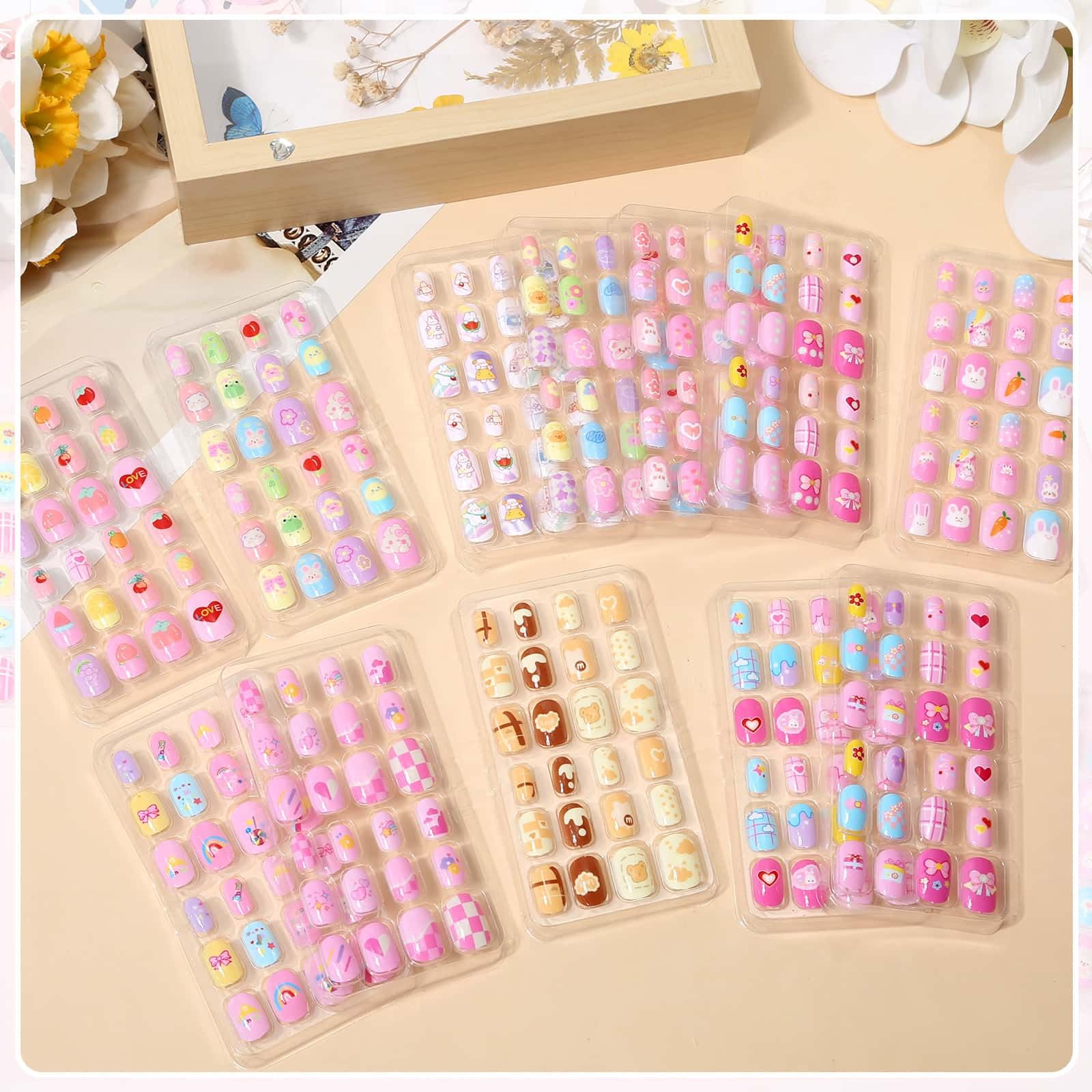 Acejoz kids press-on nails showing multiple patterns for daily looks