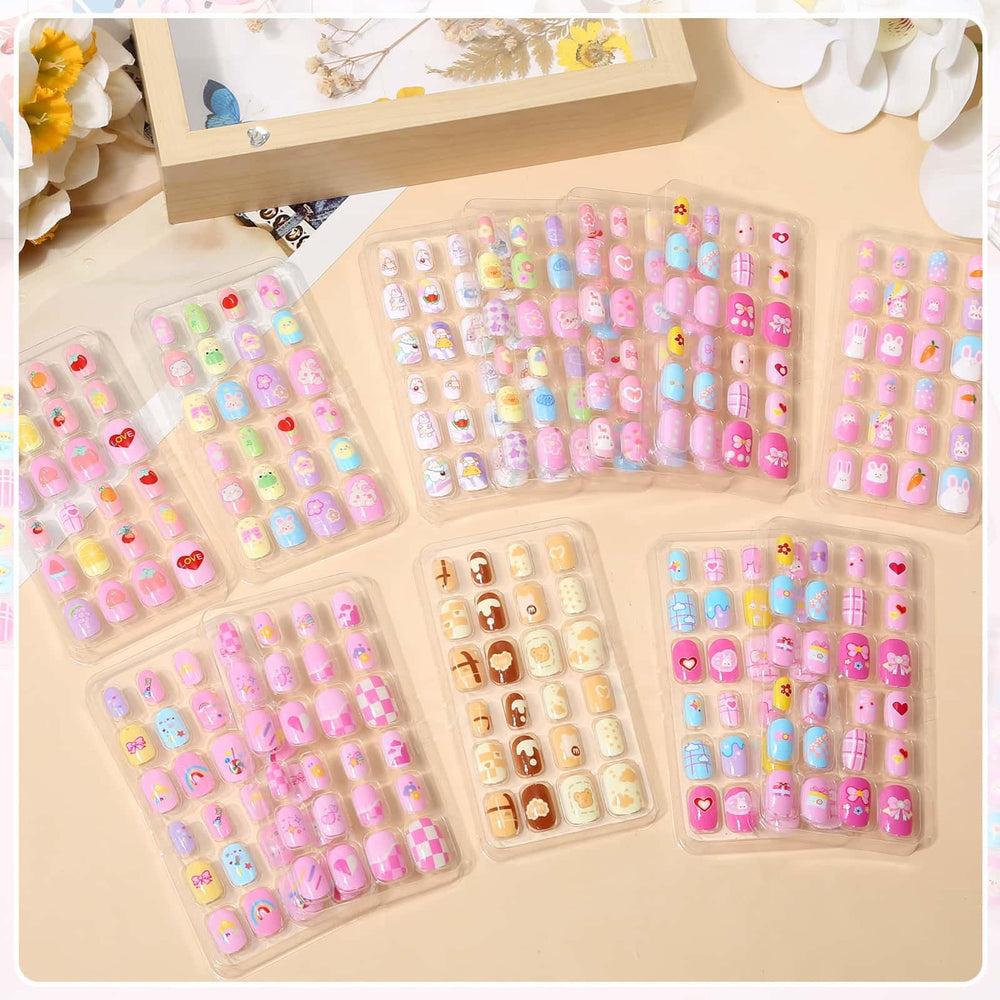 Acejoz kids press-on nails showing multiple patterns for daily looks