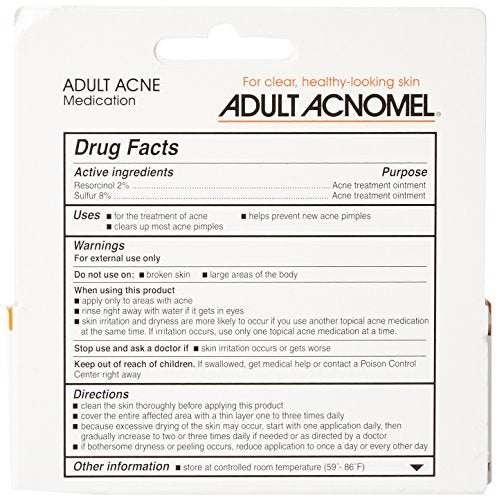 Acnomel tinted cream bottle on vanity with neutral lighting.