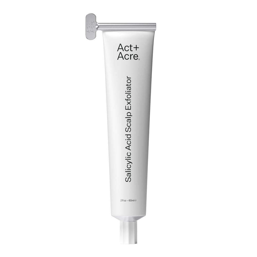 ACT+ ACRE cold processed exfoliator bottle shows fragrance-free formula for balanced scalp care.