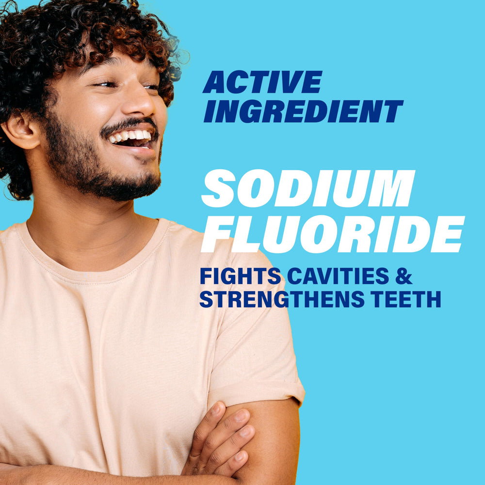 ACT pouring mouthwash into dosing cup for easy one-minute rinse