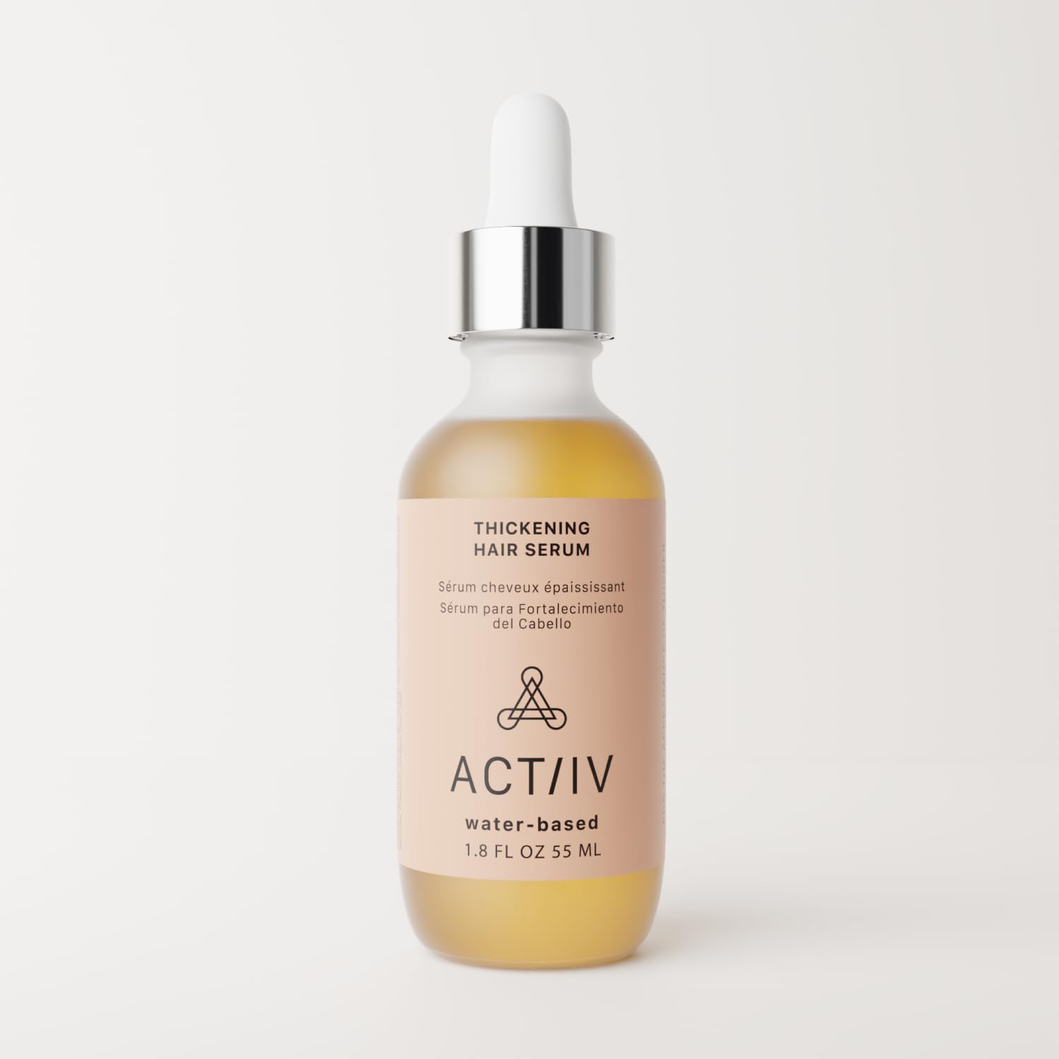 ACTIIV Thickening Hair Serum dispense and hairline image illustrating easy application