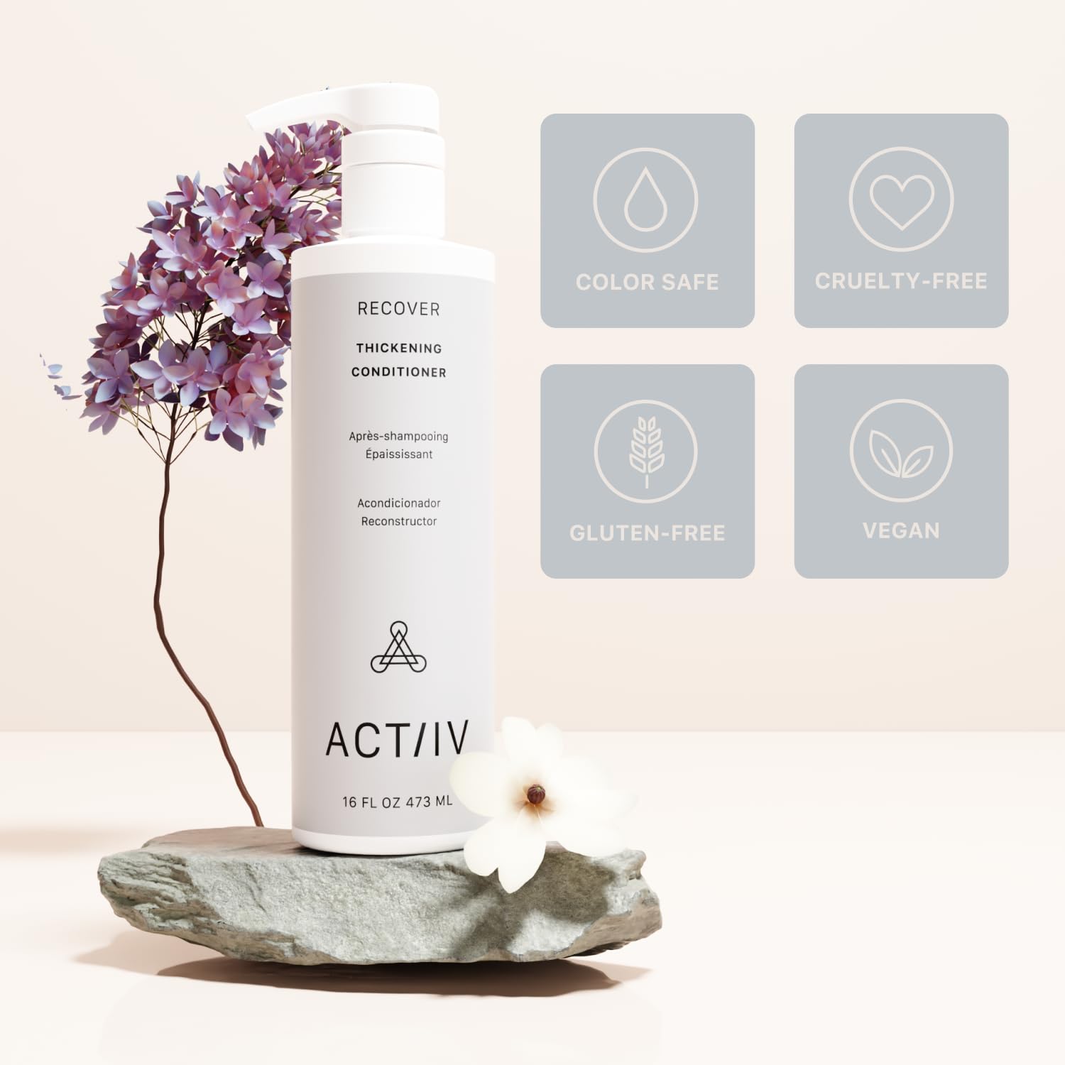 ACTIIV Recover Thickening Conditioner being applied to hair ends for smoother feel.