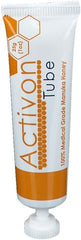 ActivOn Manuka honey gel tube being applied for wound care.