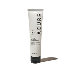 Acure Bonding Hair Mask tube close-up highlighting deep conditioning for damaged hair.