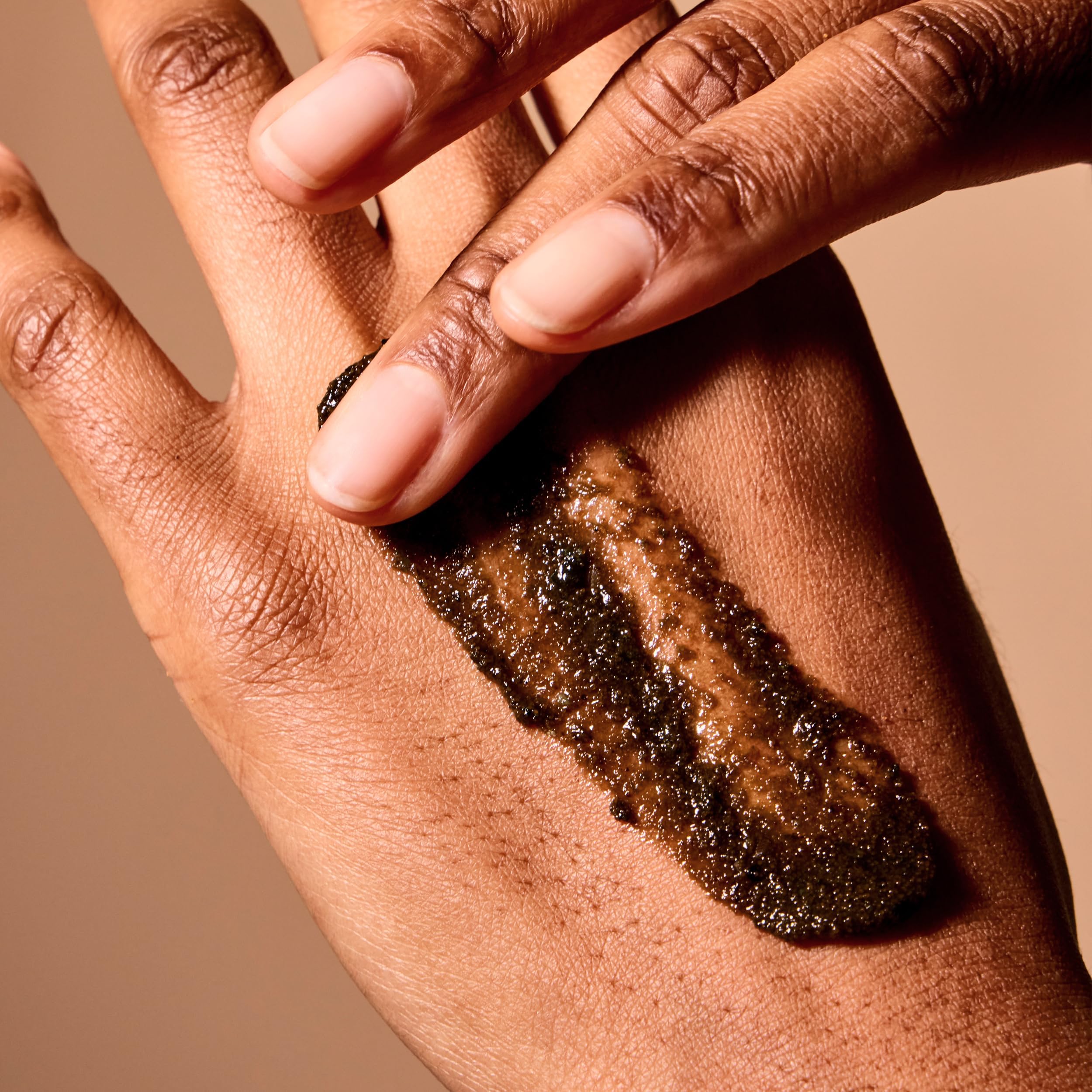 Acure Brightening Body Scrub Niacinamide detail emphasizes skin clarity.