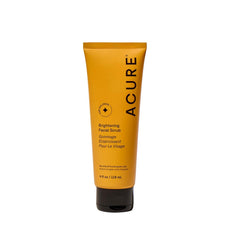 Acure Brightening Facial Scrub bottle demonstrates gentle daily exfoliation for radiant skin.