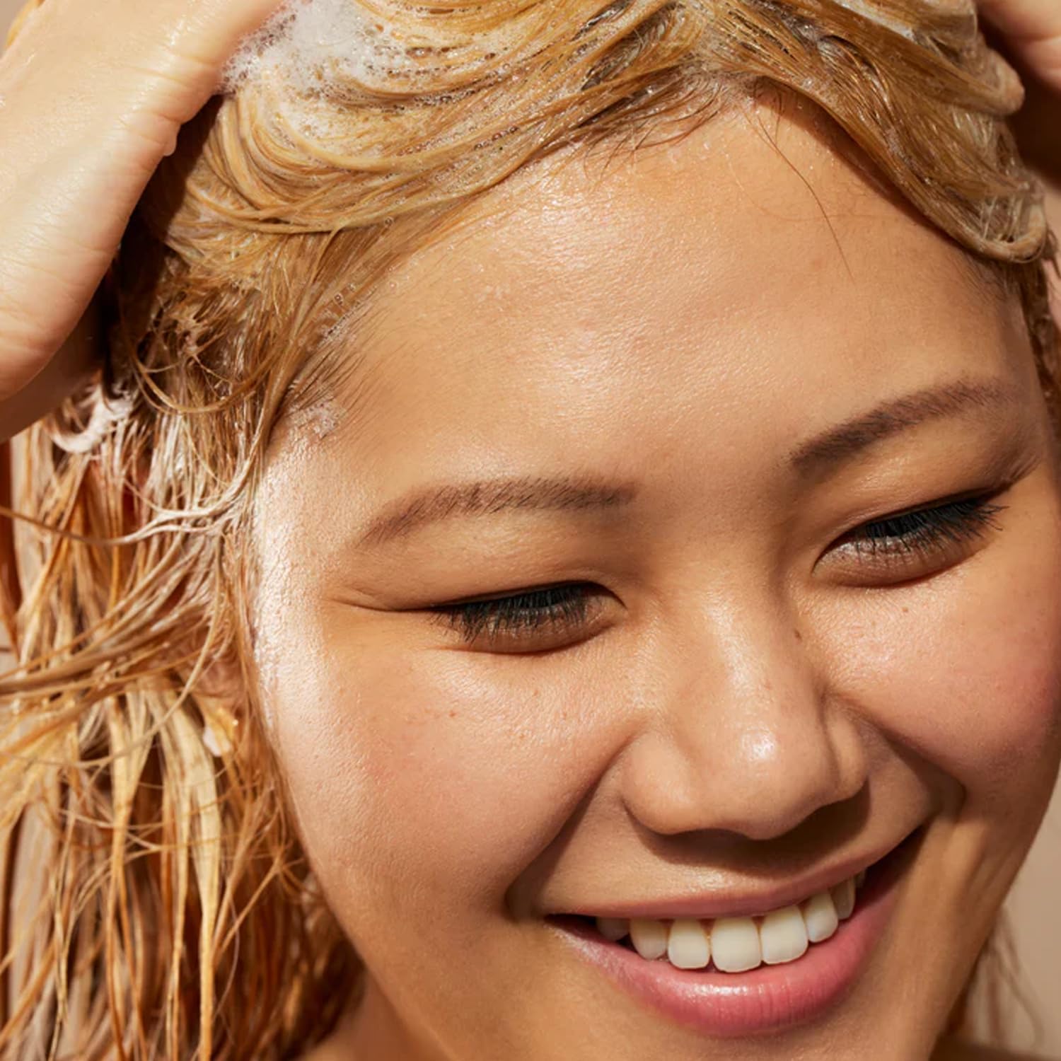 Acure Coconut water splash highlights lightweight hydration without weighing hair down.