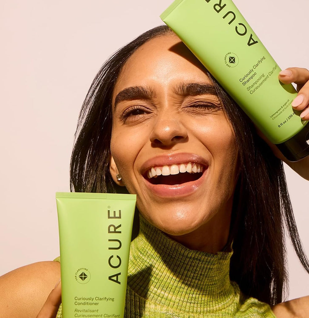 Acure Conditioner rinse close-up emphasizing lightweight hydration from mid-lengths to ends.