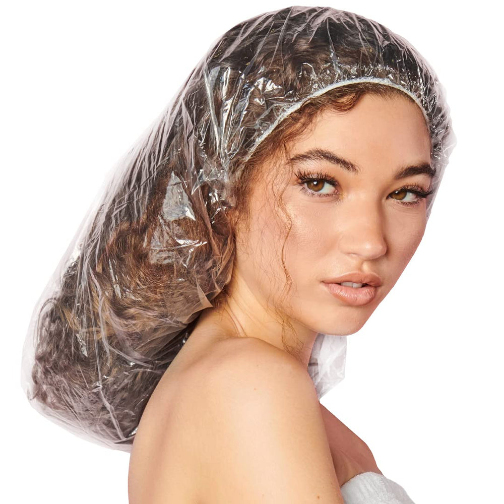 ADAMA disposable shower cap XXL clear full cap protects voluminous hair during processing and conditioning.