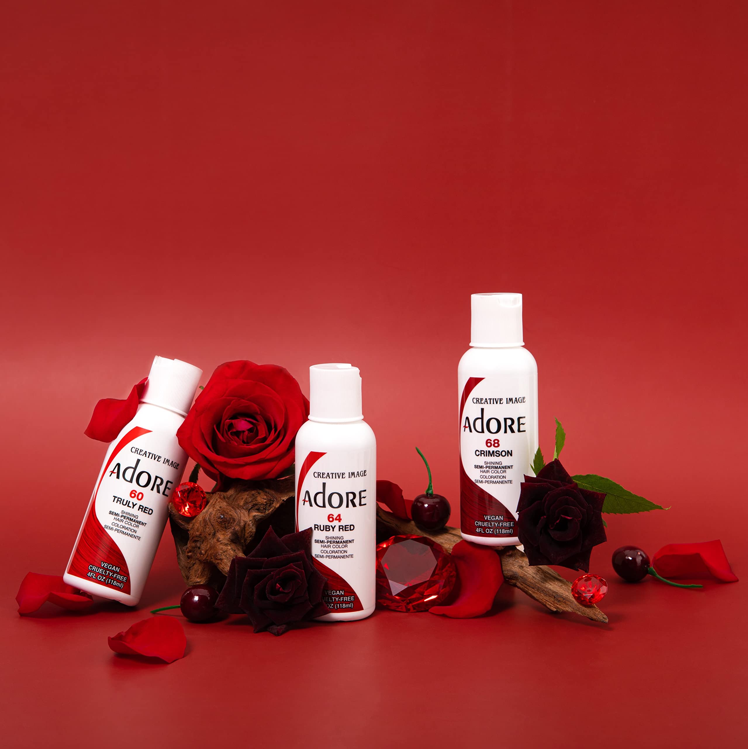 Adore Burgundy Envy packaging notes vegan and cruelty-free formula without harsh chemicals.