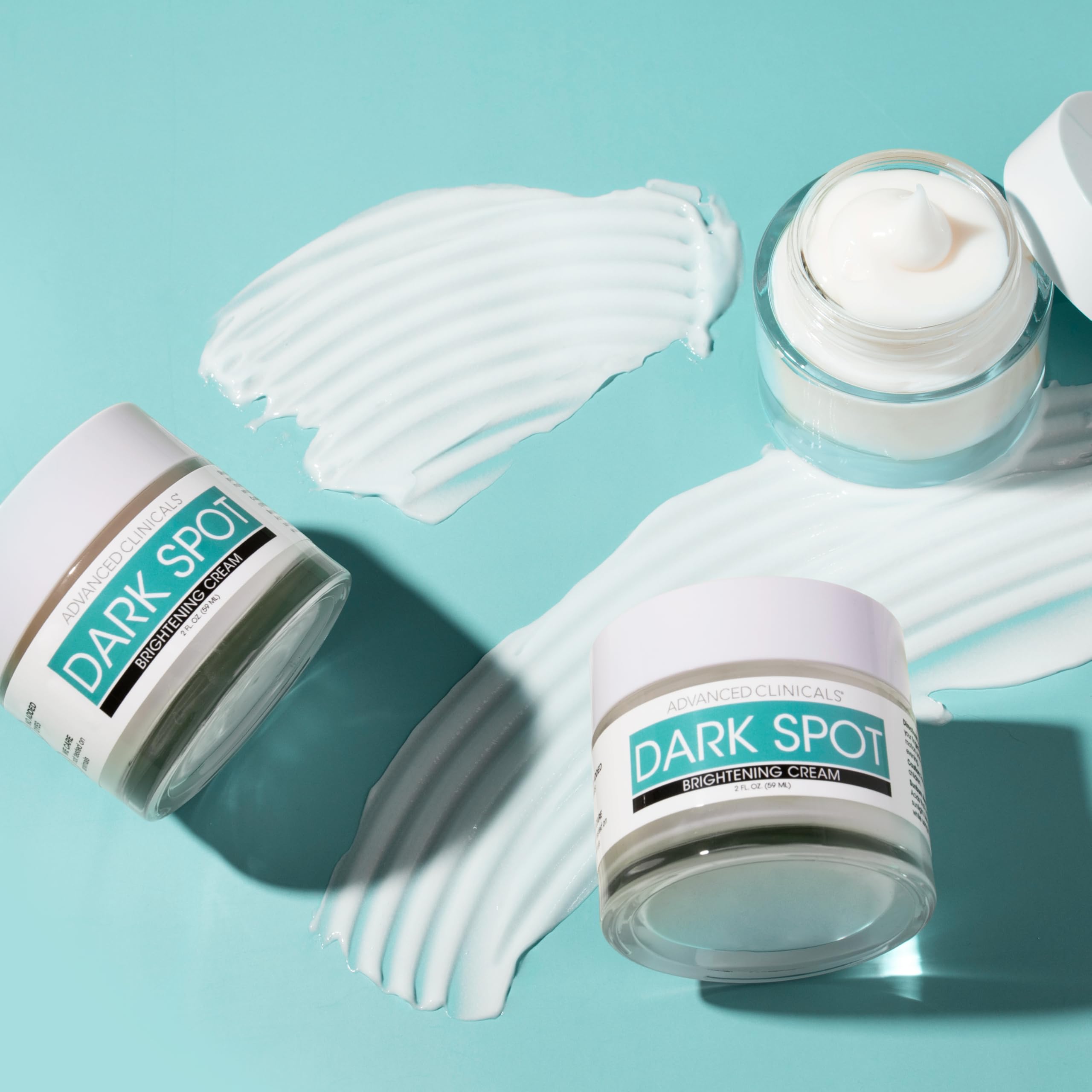 Close-up of Advanced Clinicals Dark Spot Cream on skin showing texture improvement and glow