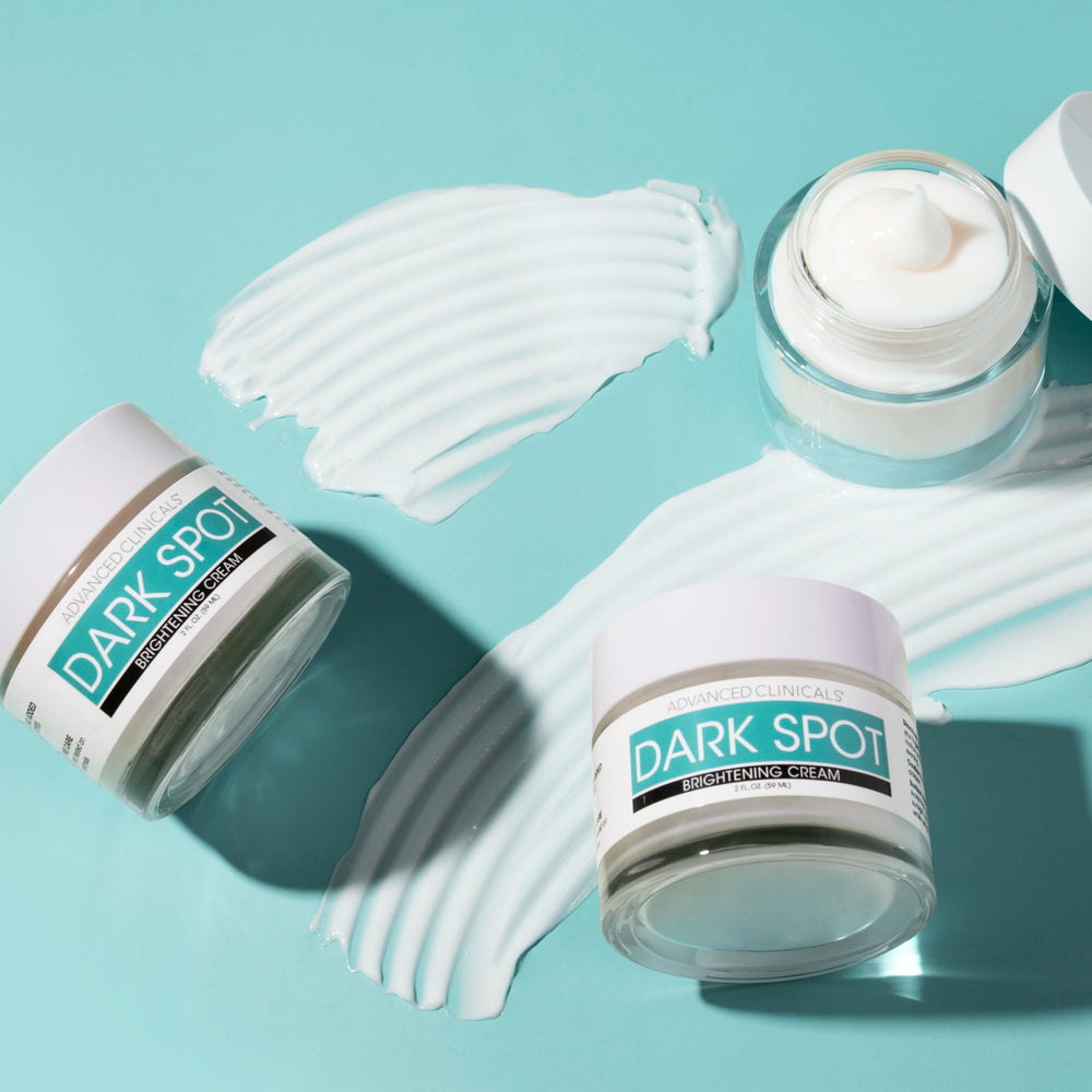 Close-up of Advanced Clinicals Dark Spot Cream on skin showing texture improvement and glow
