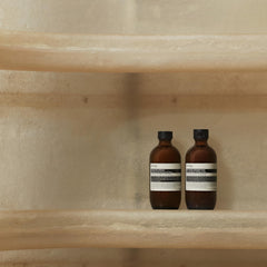 Aesop Amazing Face Cleanser low-foaming texture shown for gentle daily cleanse.